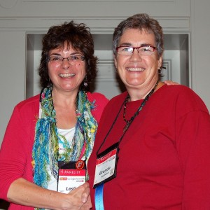 Receiving my blue "debut author" ribbon from Leslie Budewitz, national president of Sisters in Crime